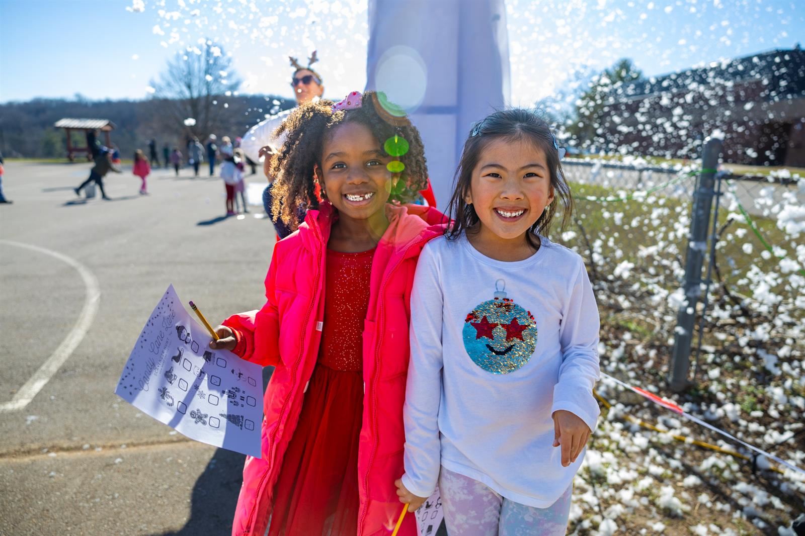 two girls smiling